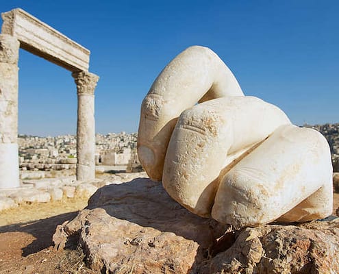 Hand of Hercules at the Citadel in Amman and Amman city in the background