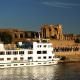 What to See Along the Nile River - A Nile Cruiser docked at the Temple of Kom Ombo on the River Nile