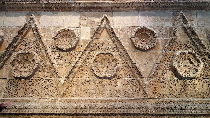 Decorated facade of the Palace of Mshatta (Jordan) at the Pergamon Museum in Berlin