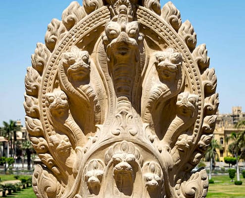 Hindu statue of snakes. One of the statues studding the terrace of the palace of Baron Empain, Cairo, Egypt