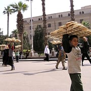 Boy selling bread in the Khan-el-Khalili bazaar