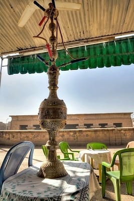 Water pipe in a cafe with view of Khnum Temple