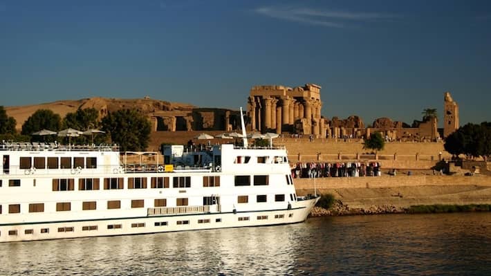 What to See Along the Nile River - A Nile Cruiser docked at the Temple of Kom Ombo on the River Nile