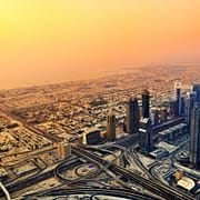 Dubai skyline along Sheikh Zayed Road at sunset