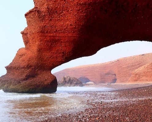 Agadir Attractions - Red archs on Atlantic Ocean coast. Agadir, Morocco