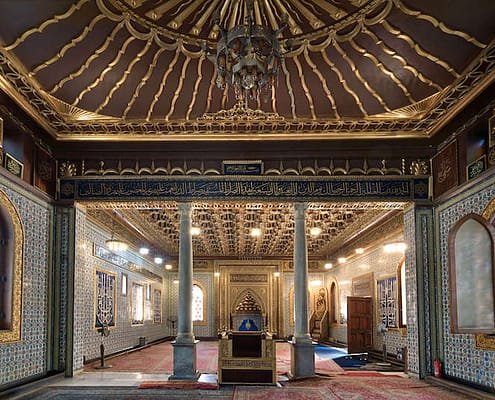 Interior of public mosque of Manial Palace of Prince Mohammed Ali with wooden golden ornate ceilings with design based on old logo of the Ottoman empire, Cairo, Egypt