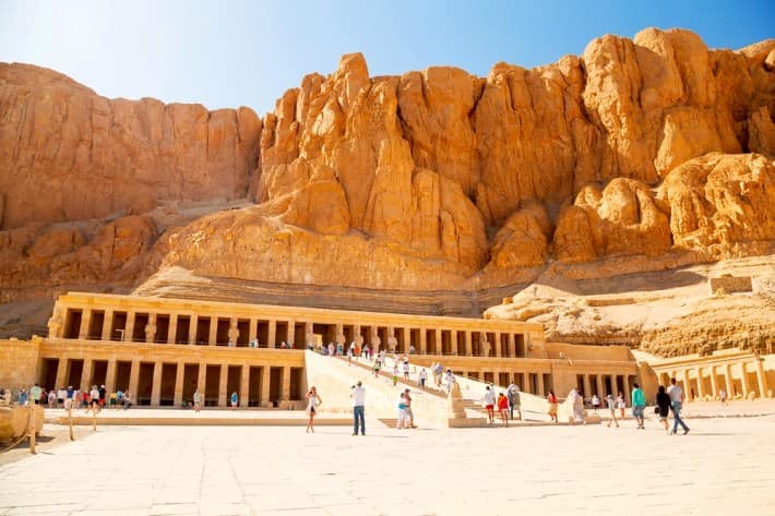 Luxor Egypt Vacation Packages - Tourists at the Mortuary Temple of Queen Hatshepsut which was dedicated to the Sun God Amon-Ra