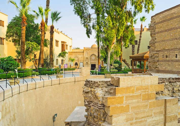 The ruins of the Fortress of Babylon with the Coptic Museum on the background.jpg