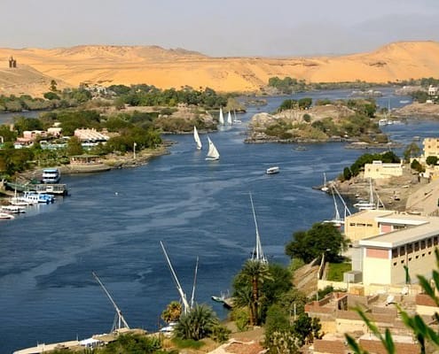 View of the Nile from Aswan with the Mausoleum of Aga Khan in the upper left corner