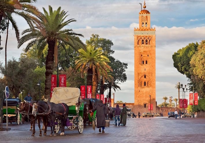 Things to do in Marrakech - Cab drivers in horse-drawn carriages around Koutoubia mosque awaiting tourists