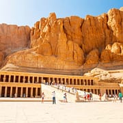 Luxor Egypt Vacation Packages - Tourists at the Mortuary Temple of Queen Hatshepsut which was dedicated to the Sun God Amon-Ra