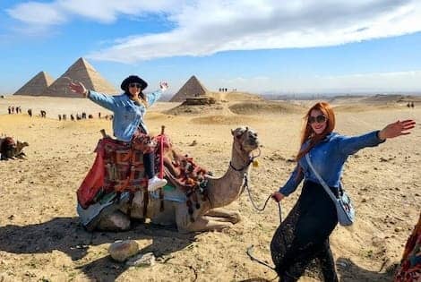 Camel ride at the Giza Pyramids, Egypt