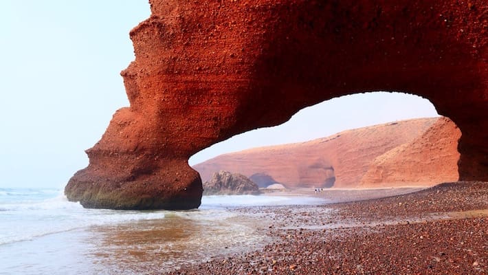 Agadir Attractions - Red archs on Atlantic Ocean coast. Agadir, Morocco