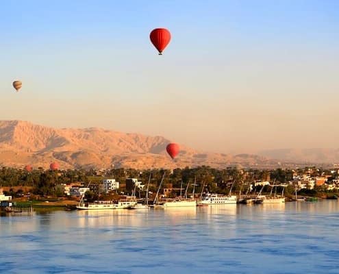 Luxury Egypt Tour with Nile Cruise - Hot air balloons over the Nile River in Luxor
