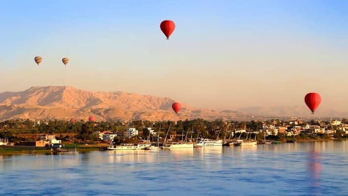 Luxury Egypt Tour with Nile Cruise - Hot air balloons over the Nile River in Luxor